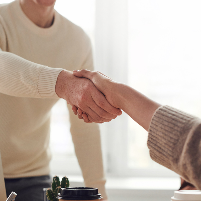 Two people shaking hands