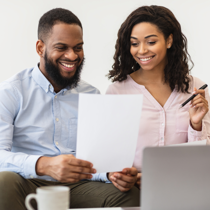 Couple reviewing policy