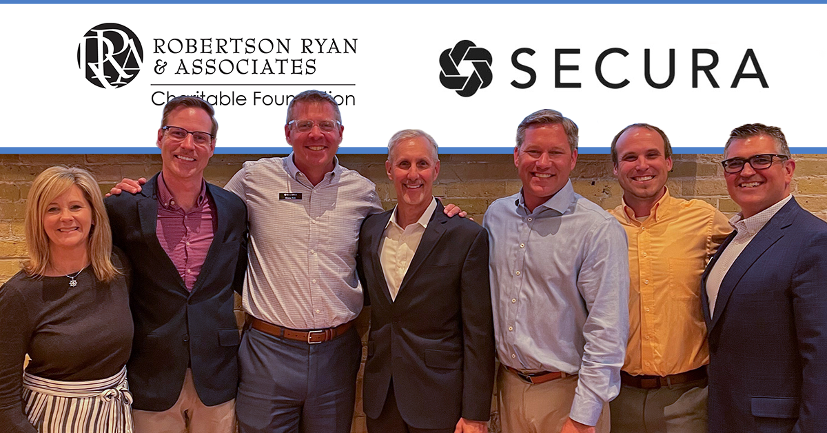 Robertson Ryan team members with Secura Insurance employees